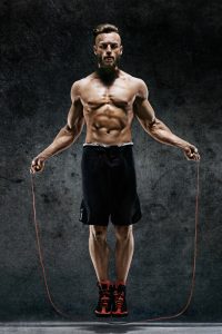 fit guy skipping rope