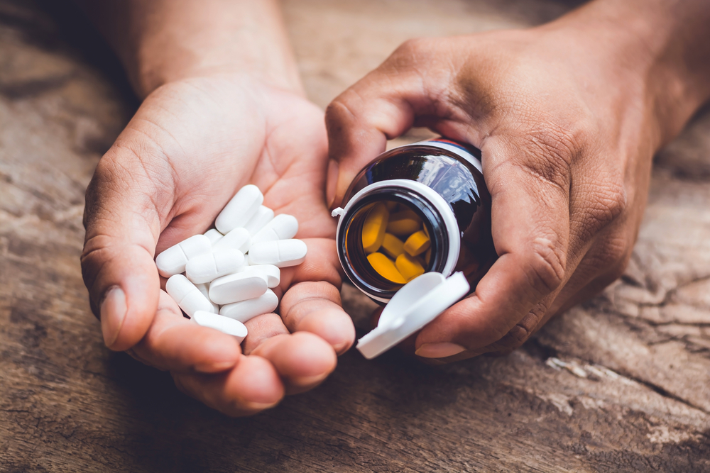 handful of male supplement capsules