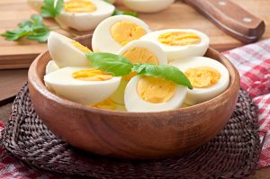 halved hard boiled eggs in bowl