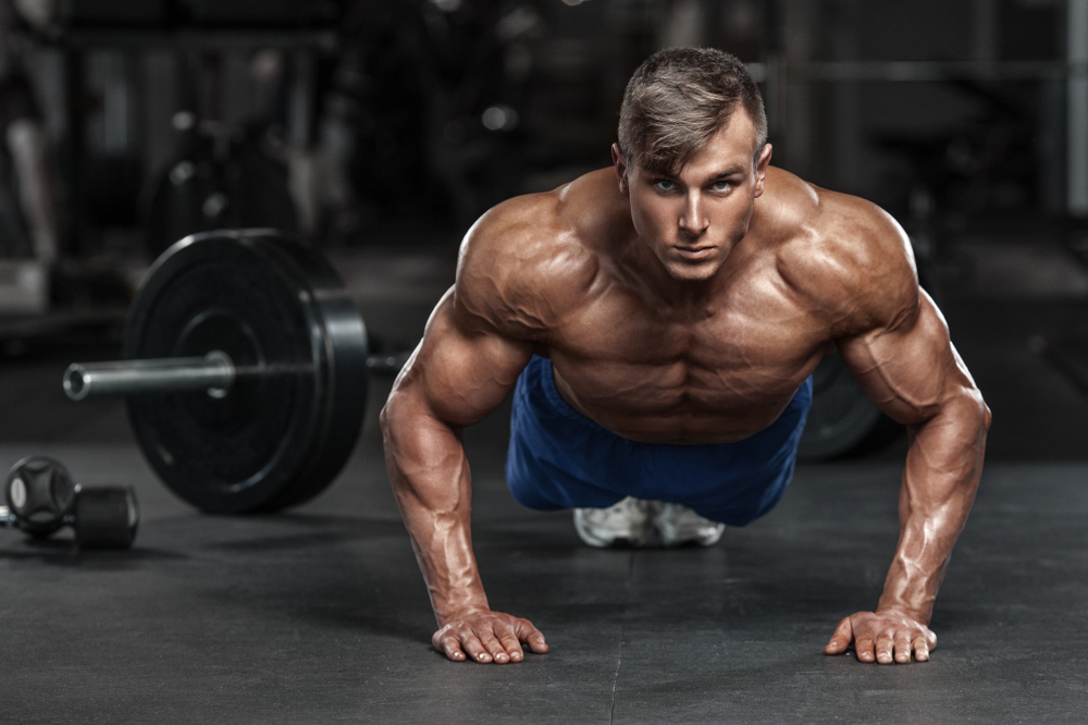 shirtless muscular guy push up