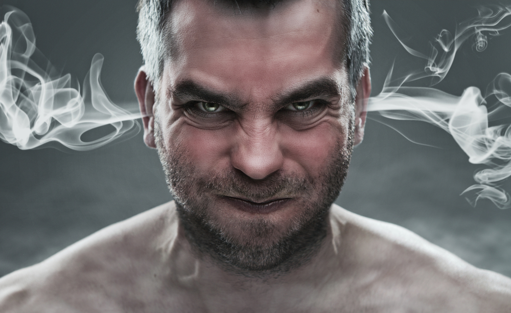 aggressive man smoking ears