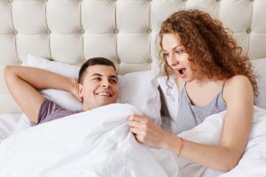 woman pleased with man's member