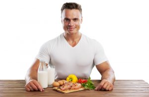 fit man shows balanced diet