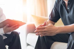 man consults his doctor