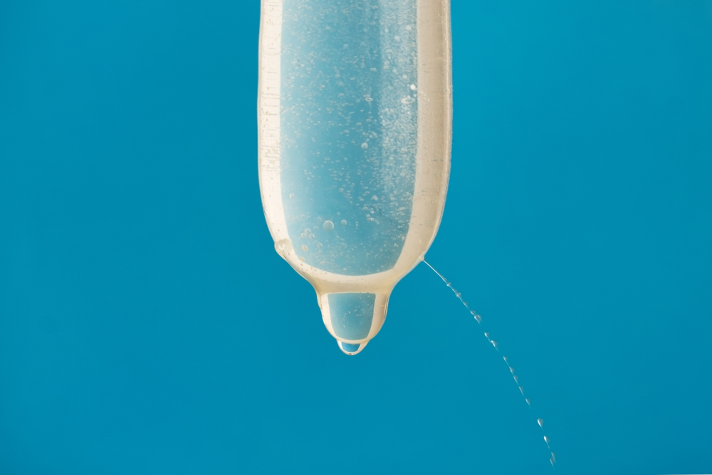 water leaking from pierced condom