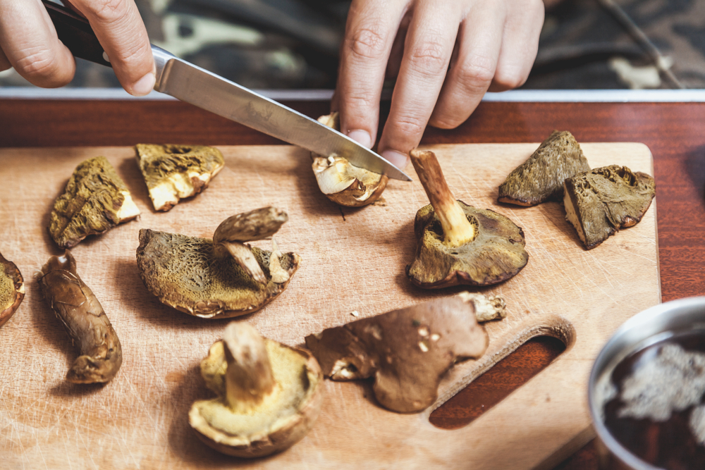 cutting up mushrooms