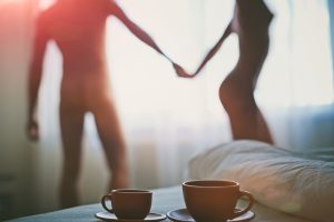naked couple and morning coffee