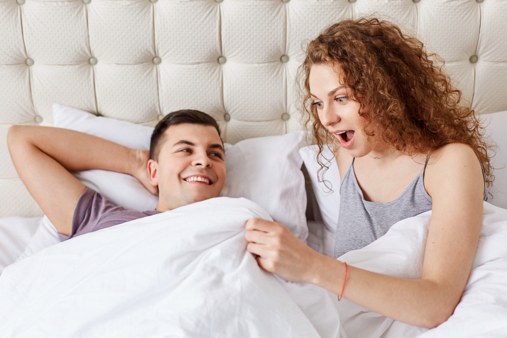 woman surprised and pleased with his package