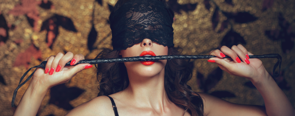 lace blindfold and whip