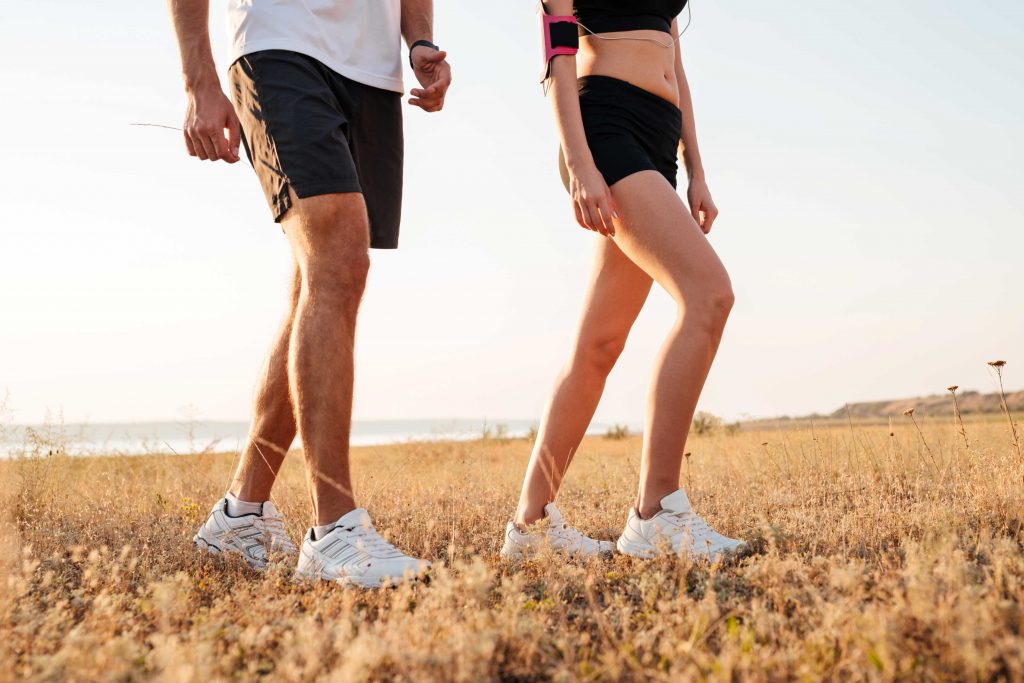 fit couple enjoying a walk