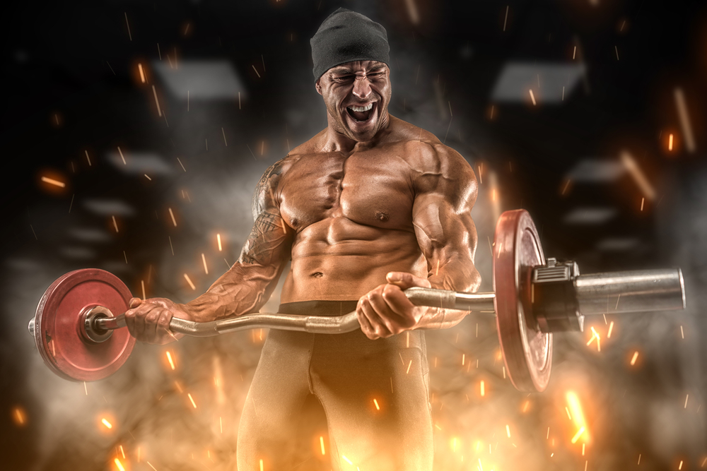 ripped guy work out on fire