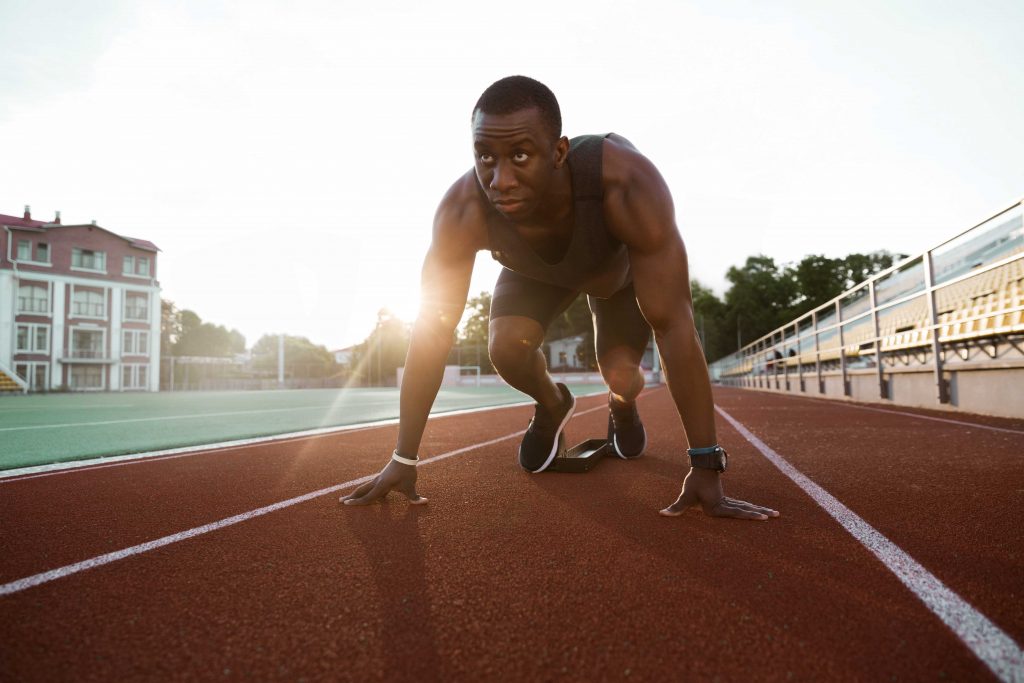 fit guy ready to sprint