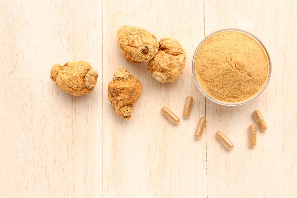 dried maca powder and supplement capsules