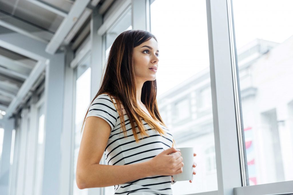 independent woman enjoying coffee