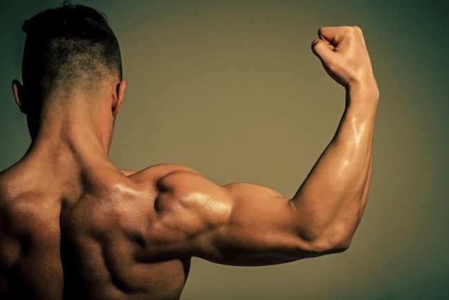 man showing biceps and triceps